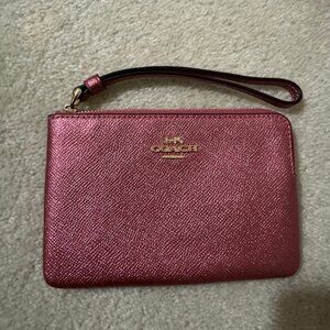 coach metallic pink wristlet
